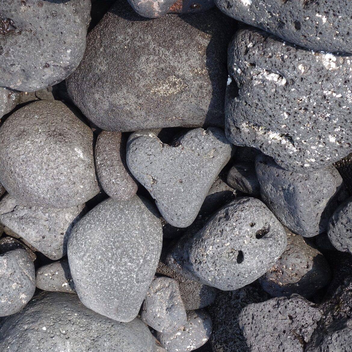 a heart shaped rock among other rocks
