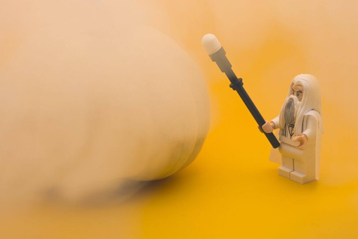 kasia-derenda-HwIQq5g5mhE-unsplash A toy wizard commanding a windstorm
