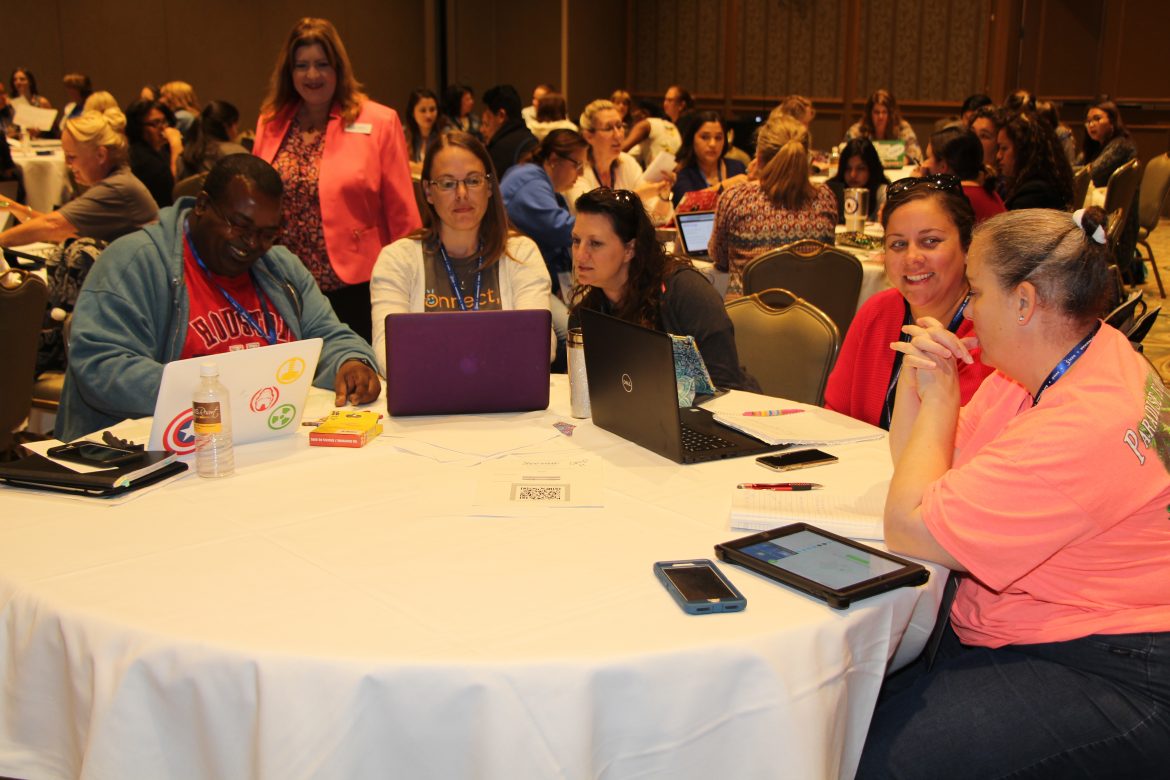 ETC Call for Proposals Elementary Technology Conference participants sitting around table.
