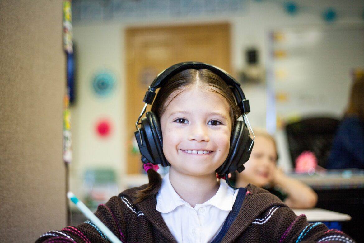 ben-mullins-je240KkJIuA-unsplash student with headphones on