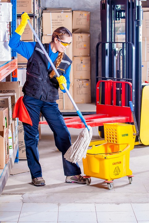 Janitor with mop and bucket