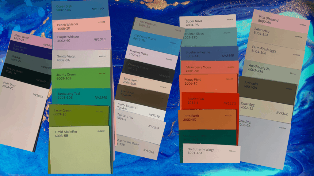 A collection of colorful paint chip cards arranged in columns on a blue marbled background. Each chip displays a unique paint color name like “Magic Wand,” “Timid Absinthe,” “The Crowd Roars!,” “Strawberry Moon,” and “On Butterfly Wings.” The names are whimsical and imaginative, ideal for creative writing prompts.