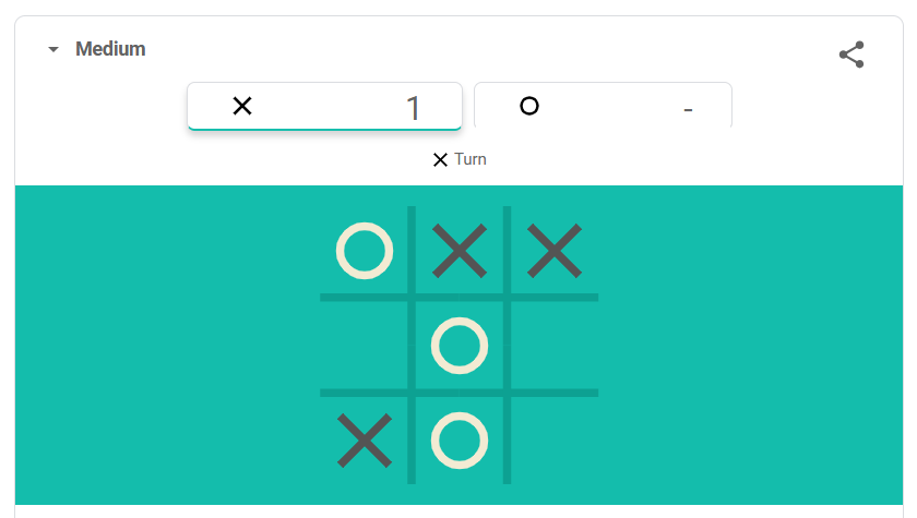 Screenshot of a digital easter egg, tic-tac-toe game showing X and O marks on a teal board, with X’s turn indicated at the top of the screen.